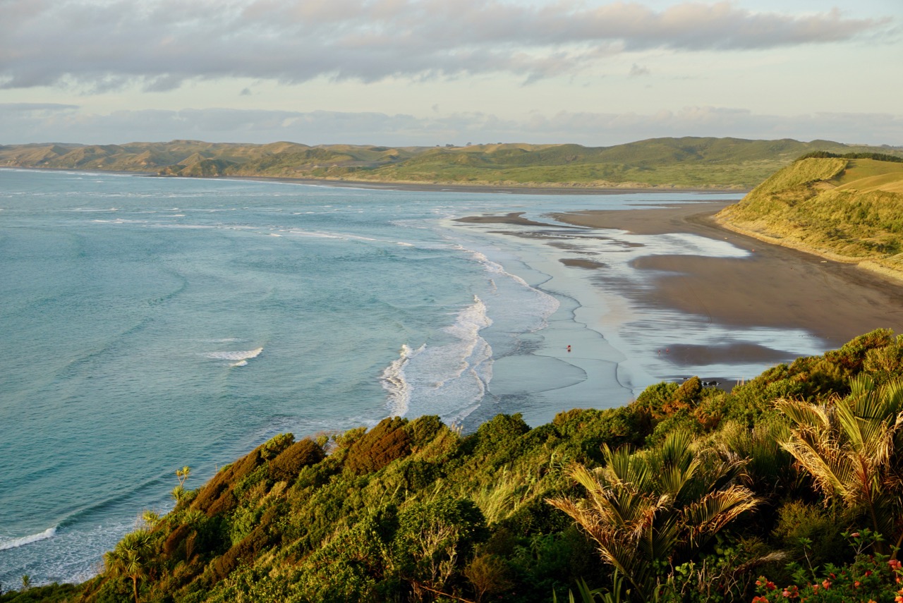 Surf's Up in Raglan, New Zealand - Two Feet, One World